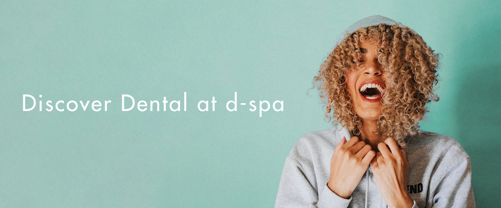 Person with curly hair and open mouth against a teal background with 'Discover Dental at d-spa' text.